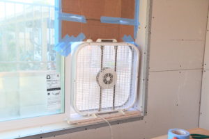 box fan in window for dust containment