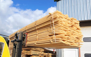 building lumber supplies on forklift at lumberyard